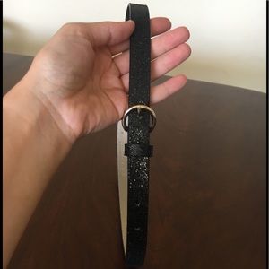 Sparkling black belt with gold buckle